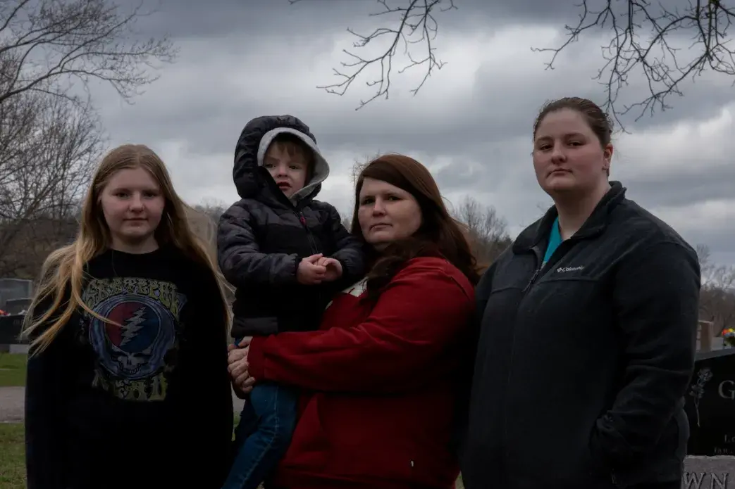 family posing for portrait
