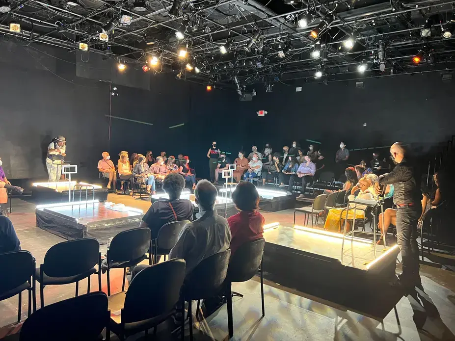 IMG_6487.jpg Educators and audience members gather for a Washington, D.C. performance of "The BOX." Image by Mikaela Schmitt. United States, 2022.
