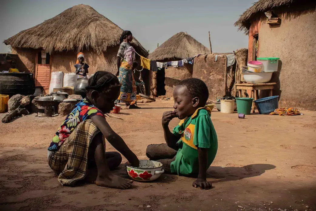 Children in Alimatu Alidu’s household, shown here, enjoy a dish made from cowpea. Image by Ankur Paliwal. Ghana, 2019.