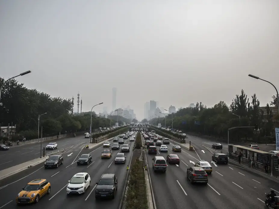 Traffic flows through Beijing, China, on Monday, Sept., 25, 2017. Image by Kelsey Kremer. China, 2017.