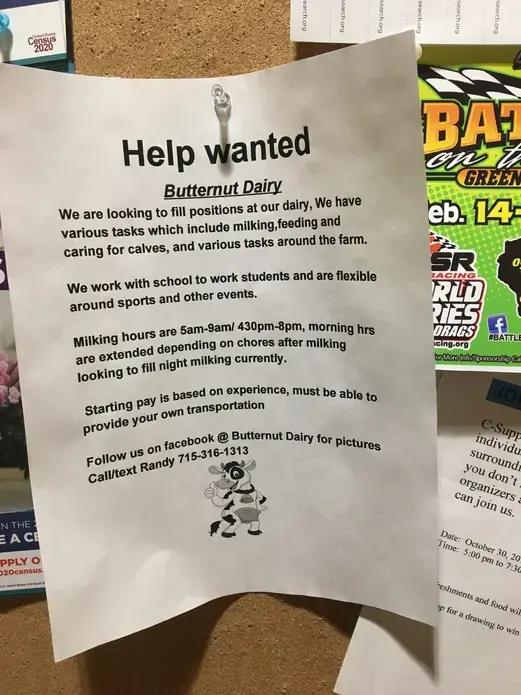A flyer on a convenience store bulletin board in Abbottsford seeks workers for Butternut Dairy in Edgar. Image by Mark Hoffman. United States, 2019.
