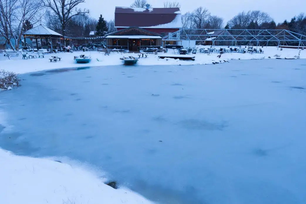 A former lagoon that once held manure is now used for fishing and swimming in the summer at the Munson Bridge Winery. Image by Mark Hoffman. United States, 2019.