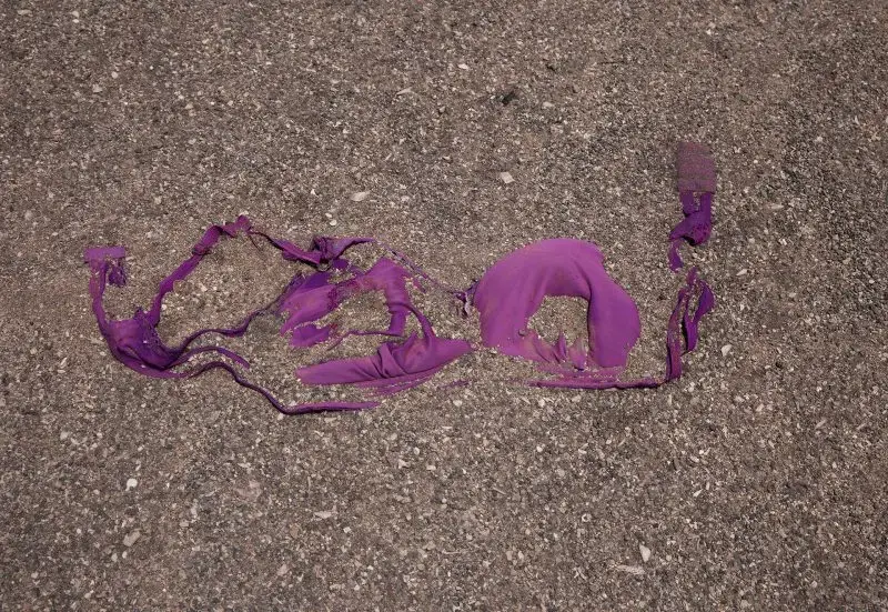 An abandoned bra lies on the beach on Obock, Djibouti, where Ethiopian migrants are gathered by smugglers for boat trips to Yemen, July 15, 2019. The U.N.'s International Organization for Migration says that the number of women making the trip jumped from nearly 15,000 in 2018 to more than 22,000 in 2019, while the number of girls quadrupled to 8,360. Despite the many risks - smugglers' exploitation, rape, hunger, drowning - they are undaunted. Image by AP Photo / Nariman El-Mofty. Djibouti, 2019.