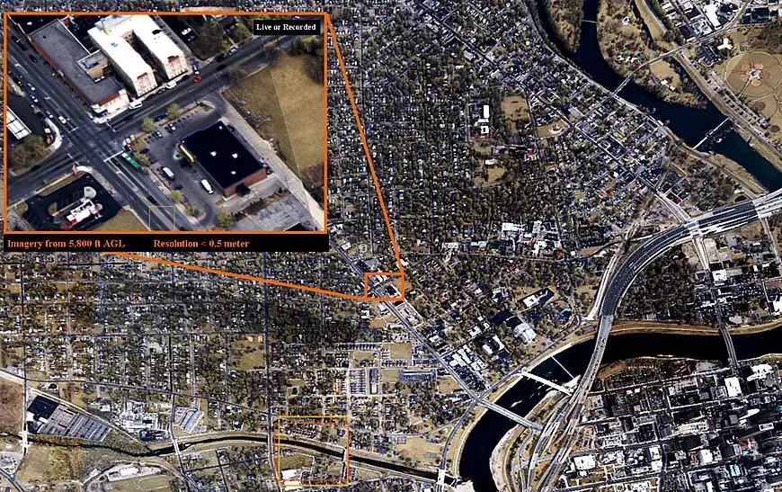 An aerial surveillance image (not captured in Baltimore), and a zoomed in area of that image used for crime analysis and tracking. Image courtesy of the NYU Policing Project. United States, undated.<br />
