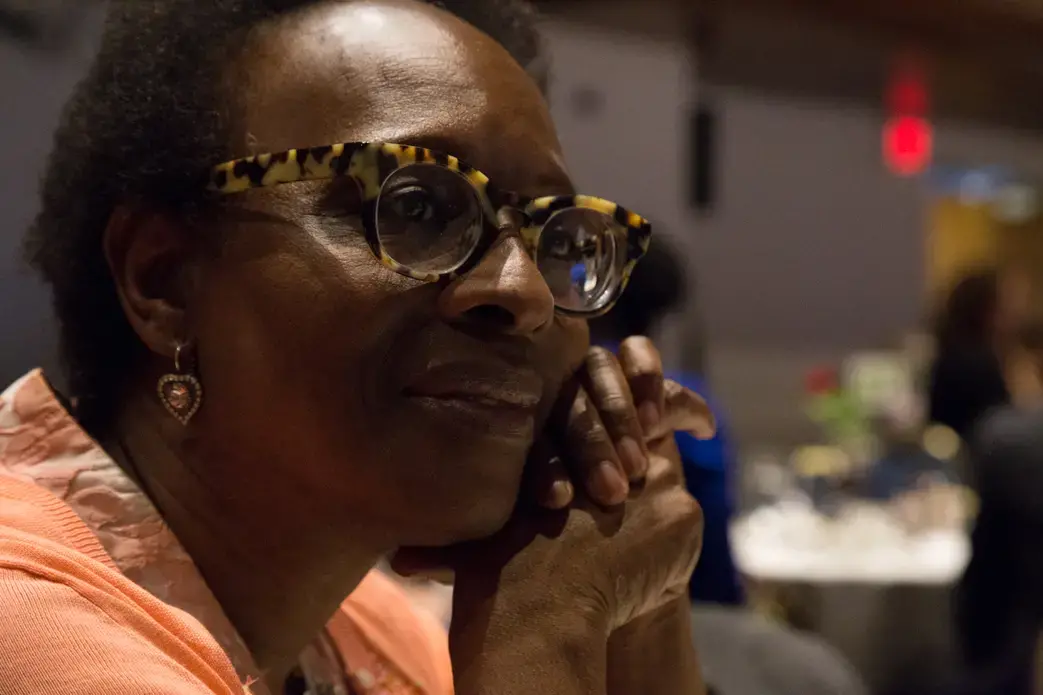 Ingrid Sturgis, journalism professor at Howard University, looks on during Jon Sawyer's evening remarks. Image by Lorraine Ustaris. Washington, D.C., 2018.