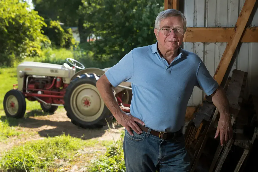 Pete Hardin, editor and publisher of the dairy trade publication The Milkweed at his home in Brooklyn, Wisconsin. Image by Mark Hoffman. United States, 2019.