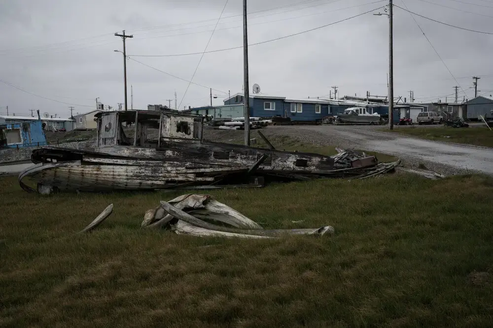 An old boat; whale bones. Image by Nick Mott. United States, 2019.
