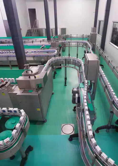 Milk is packaged at the Dairy Farming Promotion Organization in Pak Chong, Thailand. Image by Mark Hoffman. Thailand, 2019.