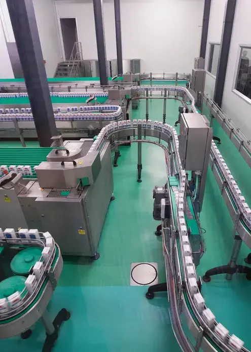 Milk is packaged at the Dairy Farming Promotion Organization in Pak Chong, Thailand. Image by Mark Hoffman. Thailand, 2019. 