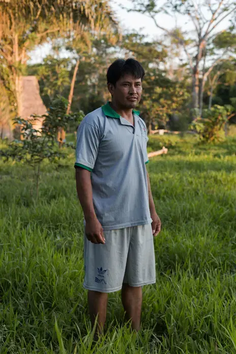 Erick Martinez, the only buyer who travels to the remote community of Las Peñitas on the Río Negro. The dream of progress and urbanization has slowly yet steadily reached the villages of the Bolivian Amazon, bringing about rapid and noticeable changes in the way of life. Image by Felipe Luna. Bolivia, 2018.