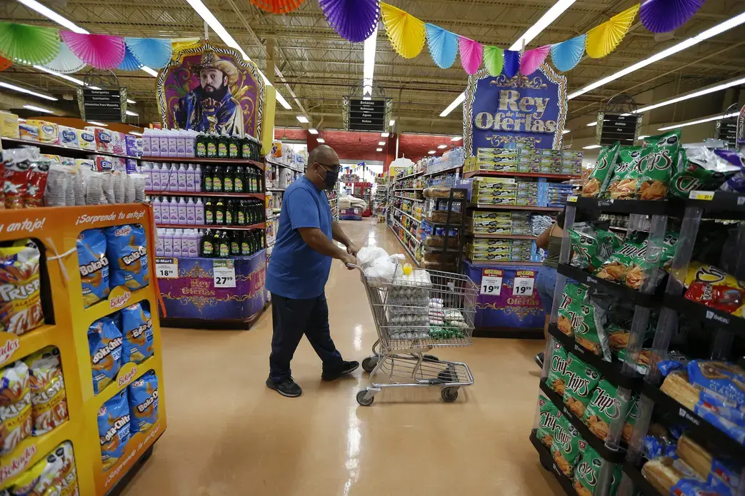 Juan Ortiz in supermarket with cart