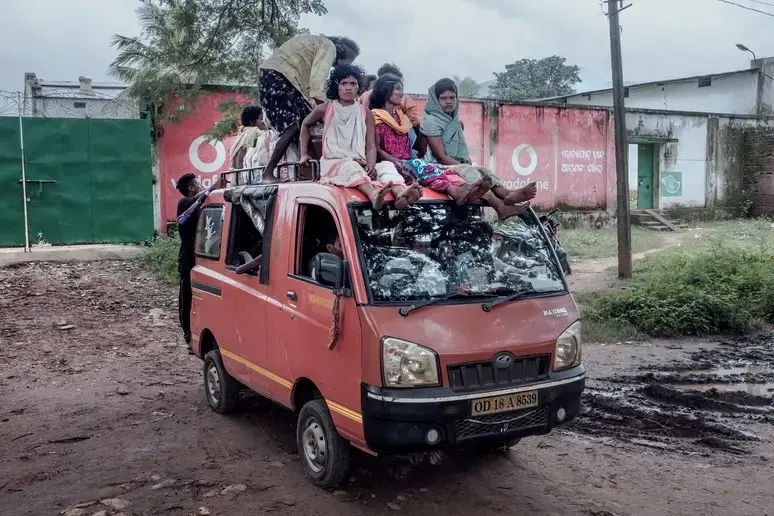 Members of the Dongria tribe returning home from the market. Image by Arko Datto. India, 2018.