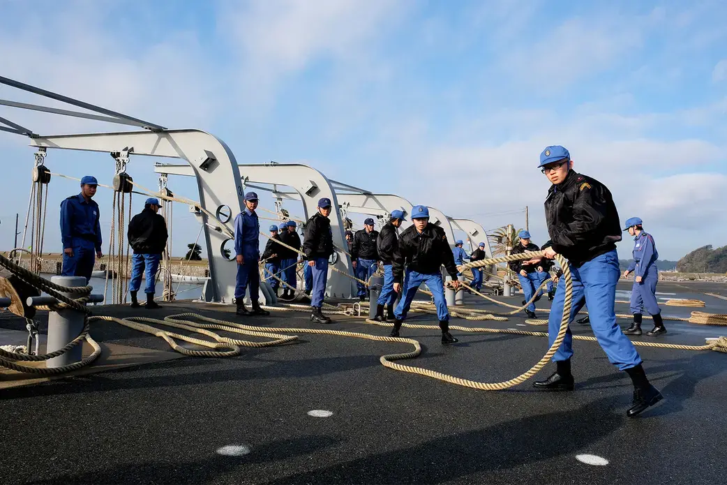 New recruits learning field skills. Image by Emiko Jozuka. Japan, 2018. 