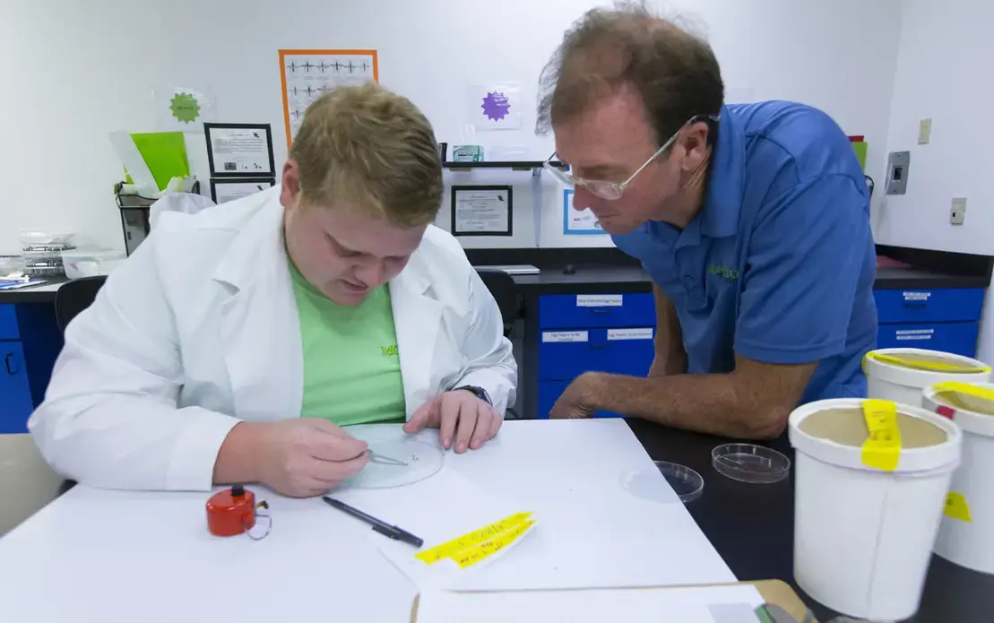Student intern Matthew Moore and operations manager William Bacon&nbsp;inventory dead mosquitoes at MosquitoMate in Lexington, Ky. MosquitoMate breeds mosquitoes carrying a bacterium called Wolbachia within their cells. The eggs they fertilize never fully develop. Image by Mark Hoffman. United States, 2017.&nbsp;