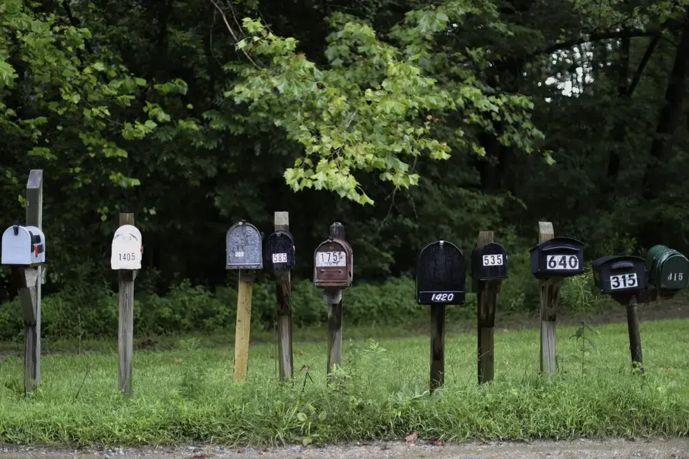 Mailboxes line a street in Jonesboro, Ill., on Sunday, Aug. 2, 2020. Image by Wong Maye-E/AP Photo. United States, 2020.