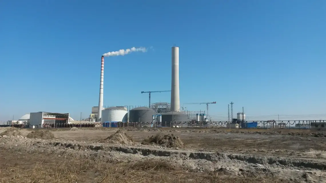A factory in Tangshan, where the heavy industries that dominate the local economy have been roiled by change, as China’s leaders seek to reduce pollution and cut back debt-driven overproduction. Image by Beth Gardiner. China, 2017.