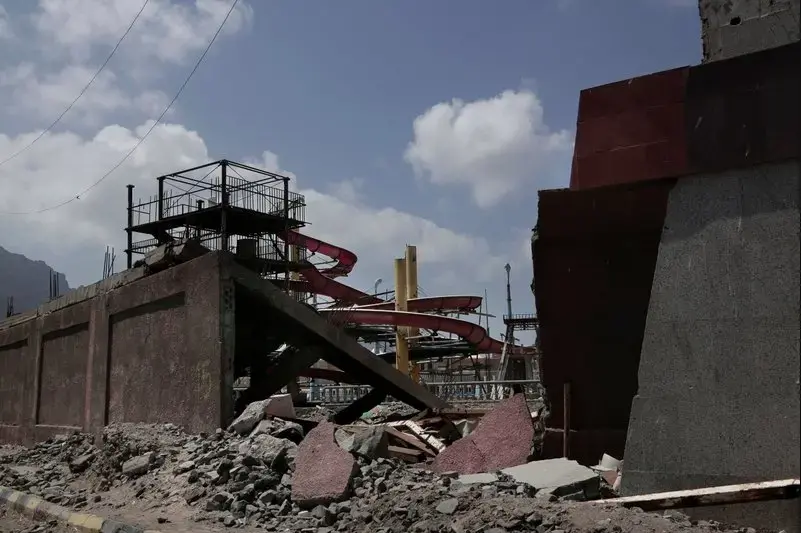 This Feb. 17, 2018, photo shows a damaged theme park in Aden, Yemen. The mood is eerie on the mostly empty streets of Aden, Yemen’s southern port city and designated seat of government that has suffered three years of civil war. Image by Nariman El-Mofty. Yemen, 2018. </p>
<p>