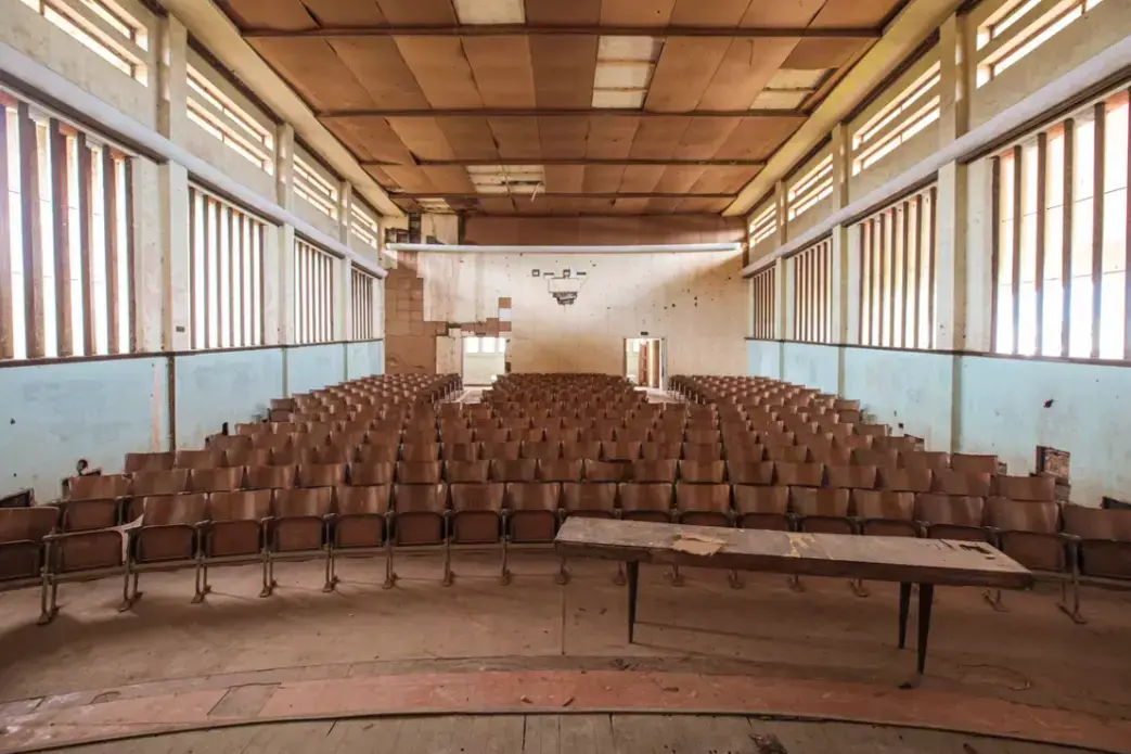 An abandoned 300-seat cinema and theater built by the Belgian colonialists. Image by Sarah Waiswa. Democratic Republic of Congo, 2019.