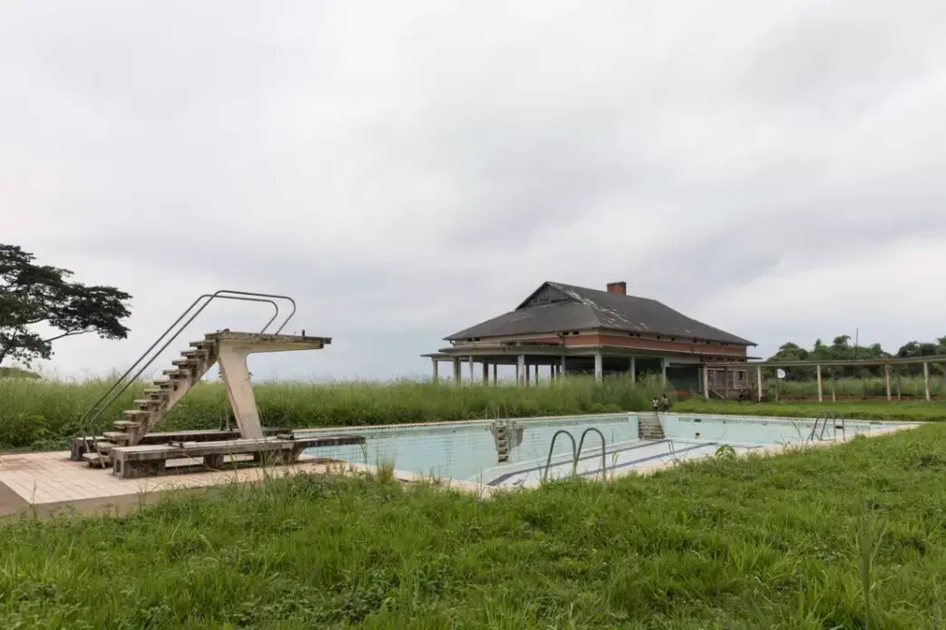 A swimming pool and pavilion are now in ruins. Image by Sarah Waiswa. Democratic Republic of Congo, 2019.