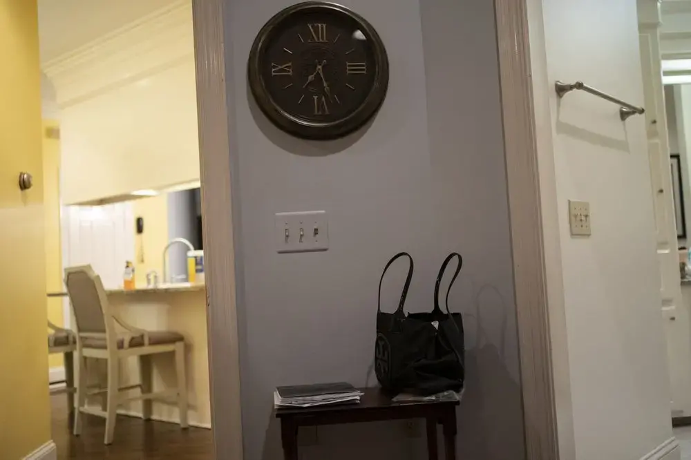 Bonnie Bishop's purse sits on a table in her bedroom. Image by Wong Maye-E/AP Photo. United States, 2020.