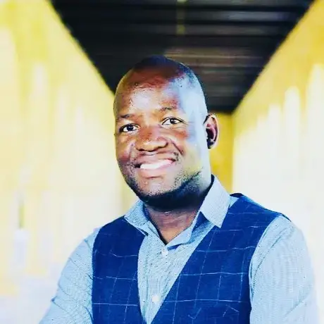 Divine Dube headshot