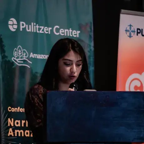 Camila Albuja speaks at a Pulitzer Center event in Quito.