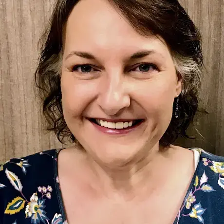 Headshot of Michelle Mowery smiling.