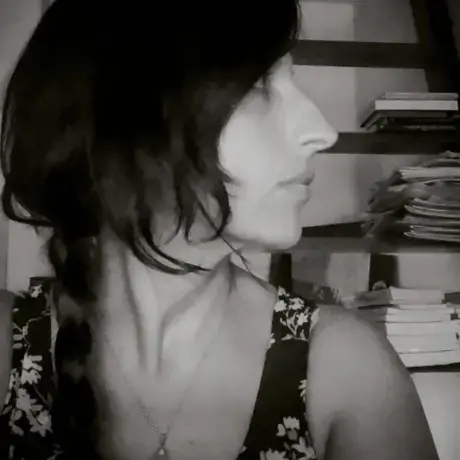 Black and white side profile of a woman with dark hair