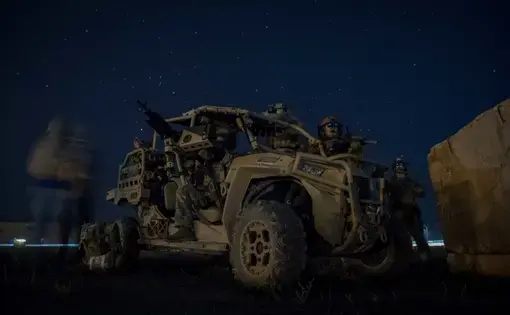 U.S. service members prepare for exfil during a training event at an undisclosed location in Afghanistan in support of Resolute Support, March 6, 2020. ORS is a NATO-led train, advise, and assist mission seeking reconciliation and peace for Afghanistan. Image by Staff Sgt. Joel Pfiester / U.S. Air Force / DVIDS (Defense Visual Information Distribution Service). Afghanistan, 2020.