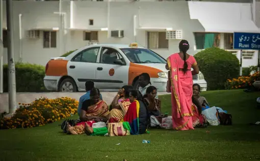 Indian and Sri Lankan domestic workers catch up with each other in a local park in Muscat. Image by Svanika Balasubramanian. Oman, 2019.