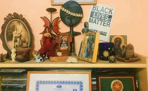 Black Lives Matter poster from a rally in Ontario, Canada, is displayed among some of documentary-filmmaker Gloria Rolando's possessions in Havana. Image by Esohe Osabuohien. Cuba, 2018.&nbsp;