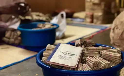 The log book of unregistered and home-based beedi workers used to keep a record of the number of beedis rolled. Image by Pallavi Puri. India, 2019.