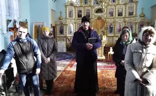 This local Ukrainian parish is deciding whether or not to continue recognizing the authority of the Russian Orthodox Church. Image by Simon Ostrovsky. Ukraine, 2019.