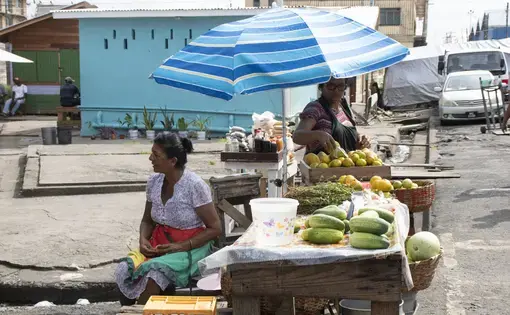 Female merchants near Guyana's Stabroek Market. The small Caribbean nation has an alarming rate of gender-based violence, with more than 1 in 2 women reporting having experienced it. Image by Daja Henry. Guyana, 2019.