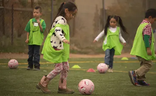 About 400 Carroll Elementary students in New Mexico participated in an all day soccer and leadership clinic, hosted by the Notah Begay III foundation. Image by Viridiana Vidales Coyt. United States, 2017.