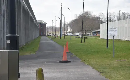 The front wall of H.M.P Belmarsh, running hundreds of yards around the maximum security facility.