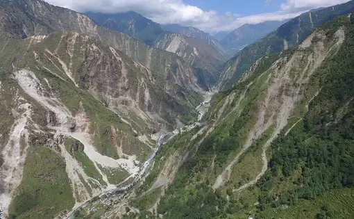 Landscape badly scarred by last year's quake