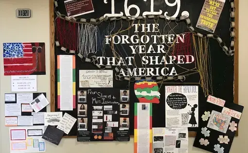 Bulletin board created by University City High School students during their investigation of issues explored by The 1619 Project. Photo by Christina Sneed. St. Louis, 2020.