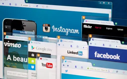 Photo of social network homepage on a monitor screen. Image by REDPIXEL.PL / Shutterstock. Poland, 2014.