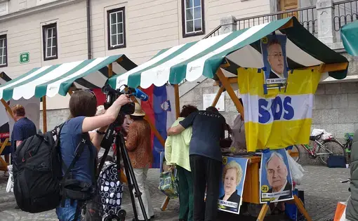 Media focuses their attention on SDS campaigning in the city center. SDS won the election with nearly 25 percent of the vote. Image by Olivia Watson. Slovenia. 2018.