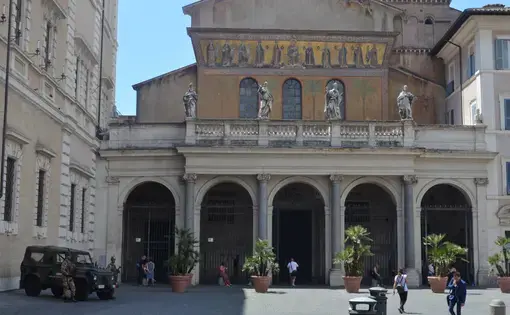 Armed guards stand watch outside of the Basilica of Santa Maria, one of the oldest churches in Rome. After the terrorist attacks in Paris and Brussels, soldiers have been stationed all over the city in tourist-centric areas: in front of government buildings, piazzas and even university campuses. Image by Amanda Ulrich. Italy, 2016.