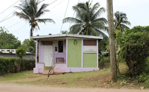 Middle-income home in Saint Catherine Parish. Image by Monica Long. Jamaica, 2018.
