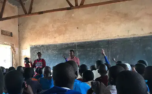 Primary school students participate in an educational session on the topic of sexual violence. Image by Keishi Foecke. Uganda, 2019.