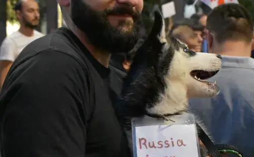 Archa, 28, protests against Russia in front of the Georgian Parliament. Image by Kaitlyn Johnson. Georgia, 2019.