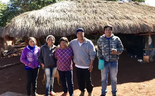Cacique (chief) Ezequiel João Kaiowá (middle wearing&nbsp;a hat)&nbsp;and his family have waited since 2006 on the creation of an official Indigenous territory that will respects the historical boundaries of their&nbsp;village.&nbsp;Image by Rafael Lima. Brazil, 2019.&nbsp;