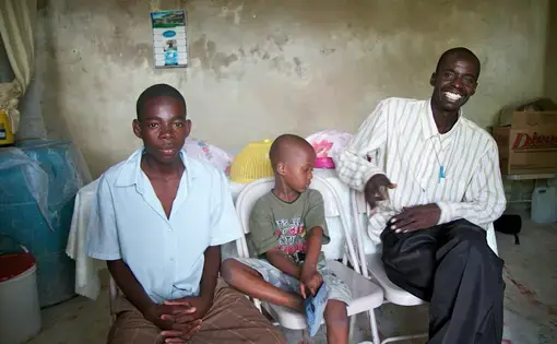 Joel Sainton and sons at their home in Carrefour, Port-au-Prince.