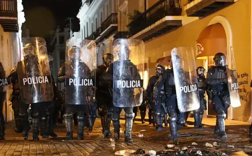 Police in Old San Juan, Puerto Rico, in July 2019, during protests against the then governor. Image by Joe Raedle/Getty Images. United States, 2019.