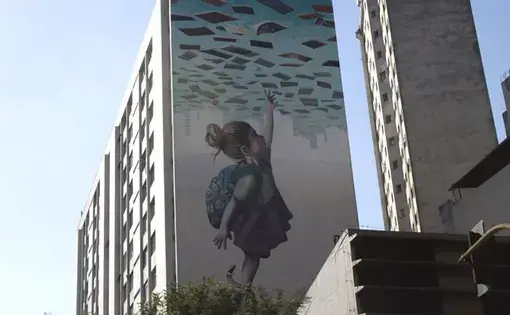 Although Brazilians have the right to education, as illustrated by this artwork on a São Paulo building, it is still out of reach for many—including, too often, people with autism. Image by Amanda Michelle Gordon. Brazil, 2018.