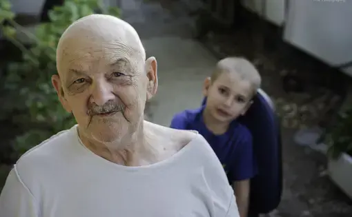 Abraham Segal with his youngest grandson, Assaf. Image by Michael Naveh, Abraham Segal's grandson. Israel, 2016.