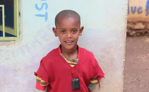 Natie Asnaunew poses for a photo at the day care center in Gondar Ethiopia. This day care center is run by Yenege Tesfa, Hope for Tomorrow, and it allows single mothers to drop their kids of everyday so they are able to go to work and help provide for their family. Image&nbsp;by&nbsp;Abigail Bekele. Ethiopia,&nbsp;2018